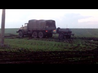 in mariupol, residents block a column of military equipment. 1